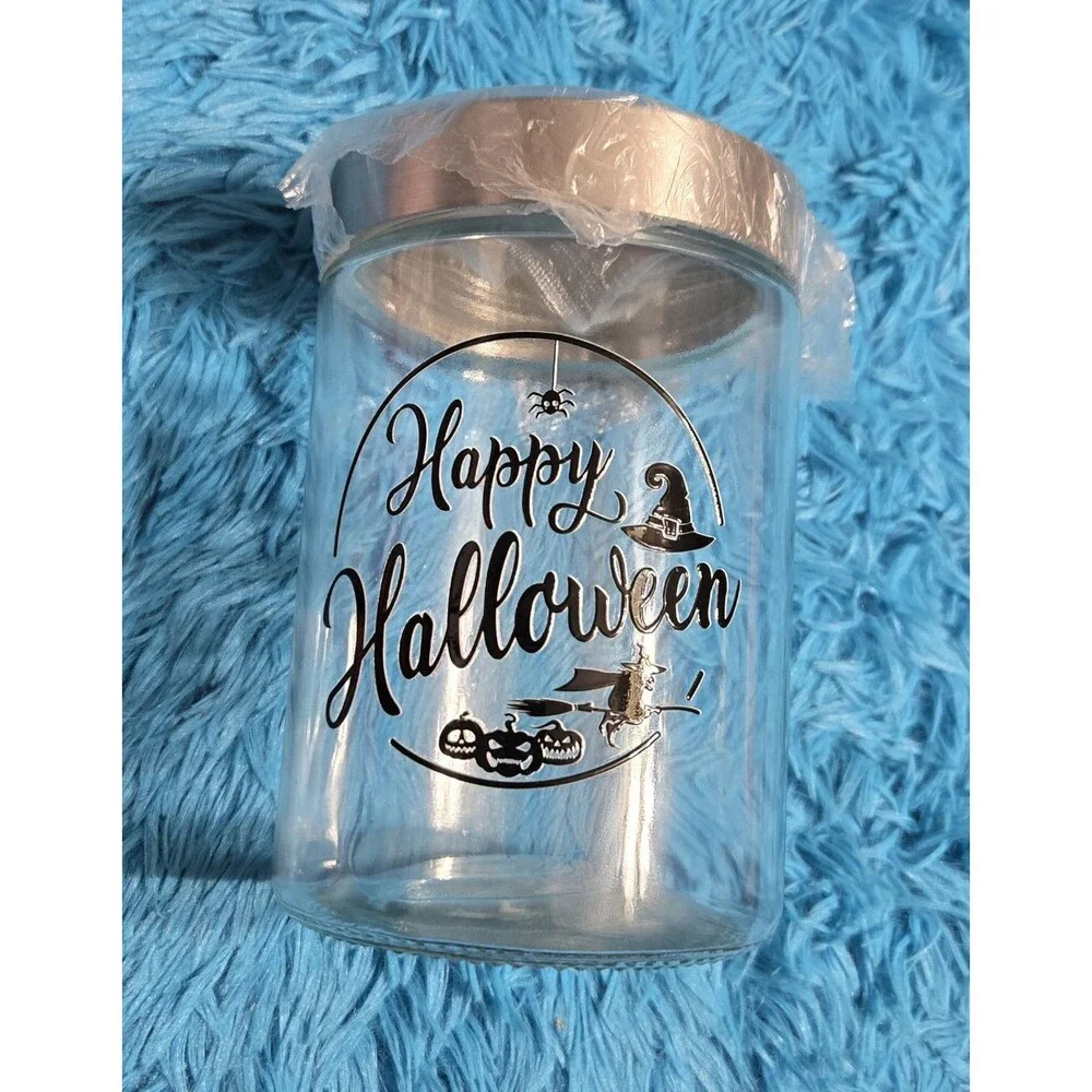 Happy Halloween Glass Jar With A Stainless Steel Lid Stands 6.75 Inches Tall
